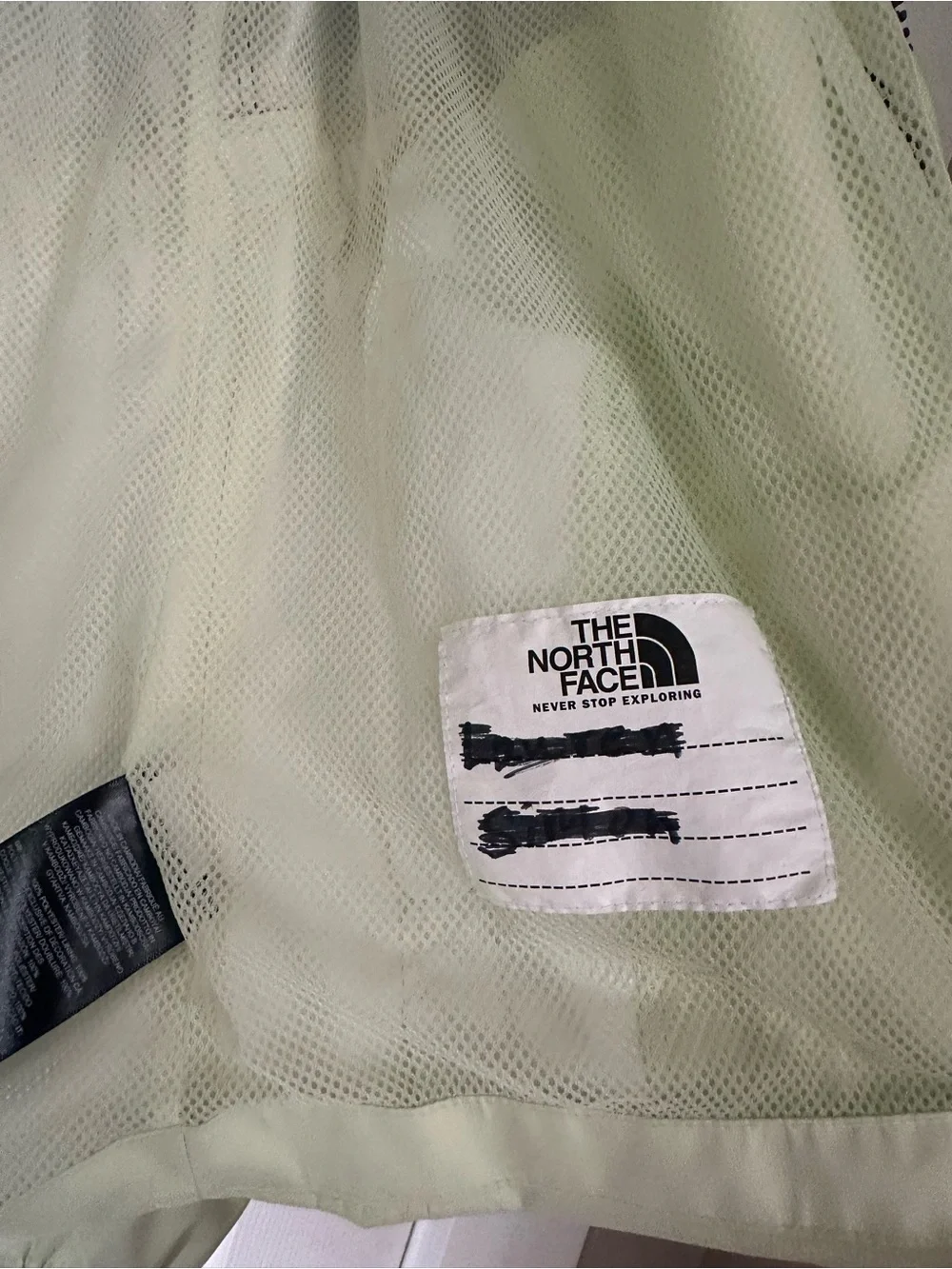 The North Face raincoat zipper protection